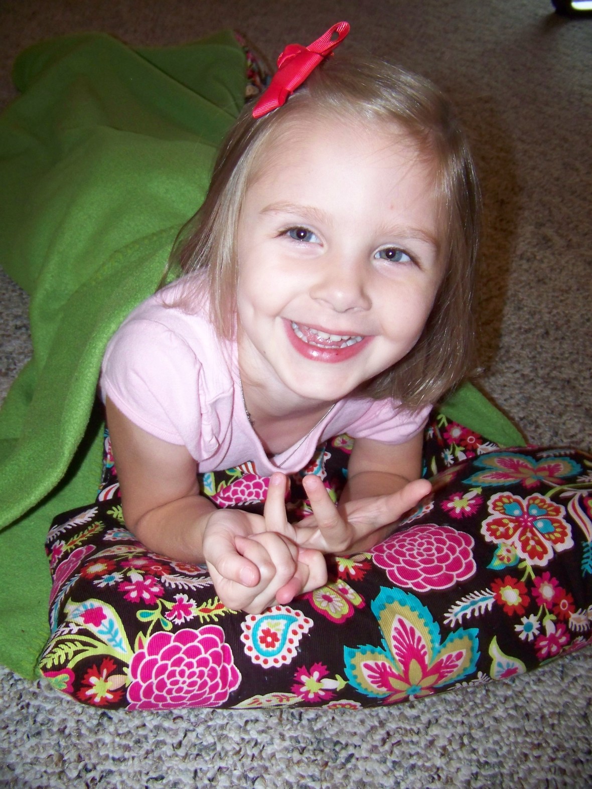 happy Katie proped on her pillow